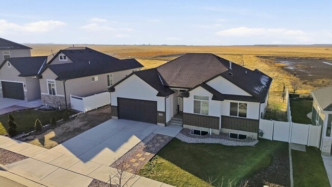 Photo - Charming 3-Bedroom Tooele Home with Garage, Basement & Fireplace