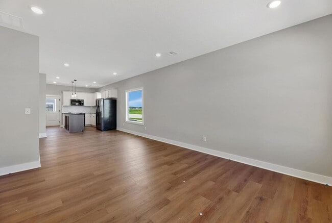 Photo - Modern 3-Bed Ranch in Maize – Zero-Entry L...