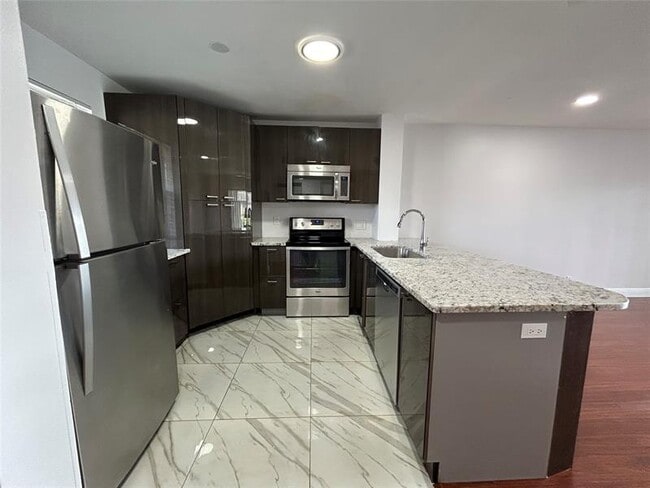 Building Photo - 2391 NW 89th Dr Unit 411