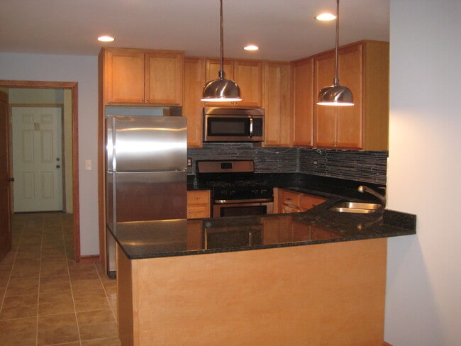 Building Photo - 3014 W Palmer Unit Garden