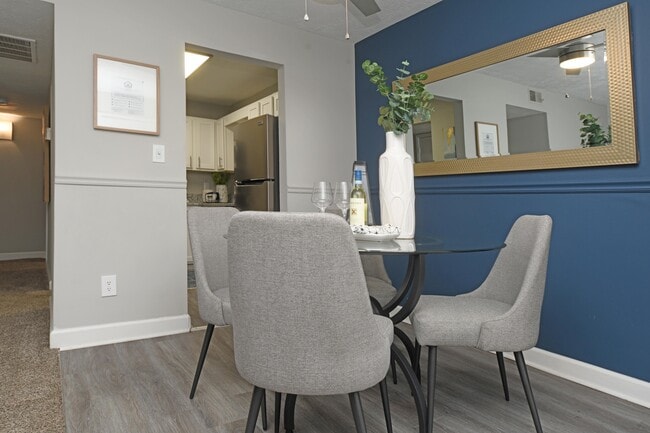 Dining area with hardwood-style flooring