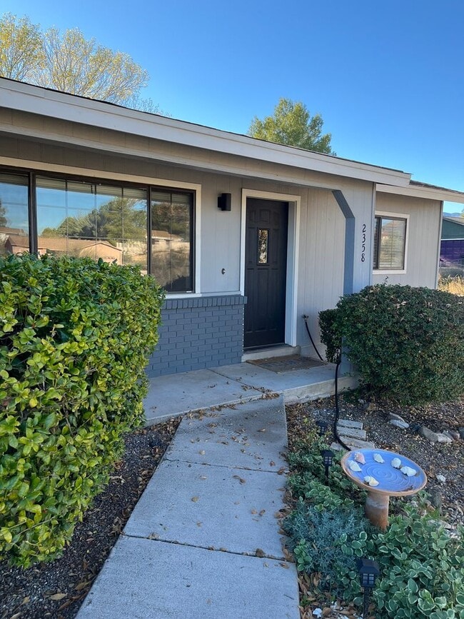 Photo - Modern, updated 3B/2B with fenced yard and sun room in Cottonwood