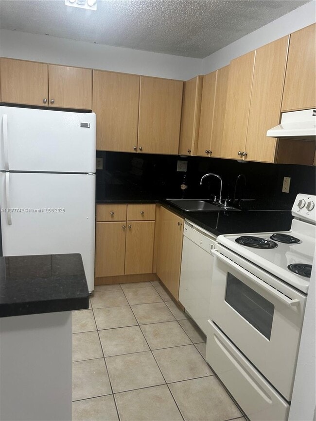 Building Photo - 7110 NW 179th St Unit 110 Rental