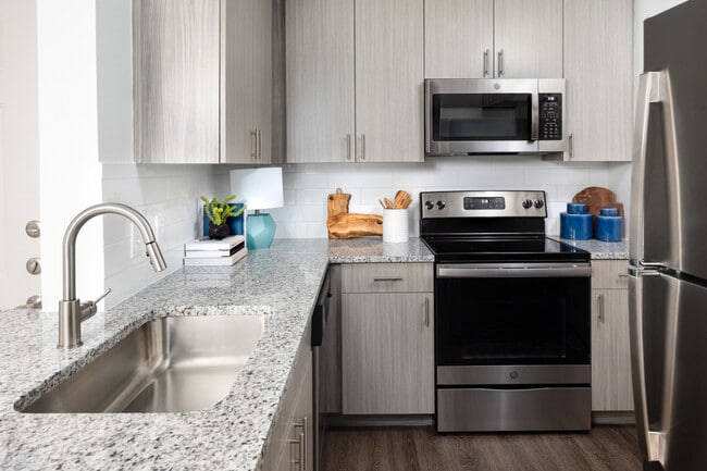 Beautifully remodeled kitchens with stainless steel appliances - Montelena Apartments