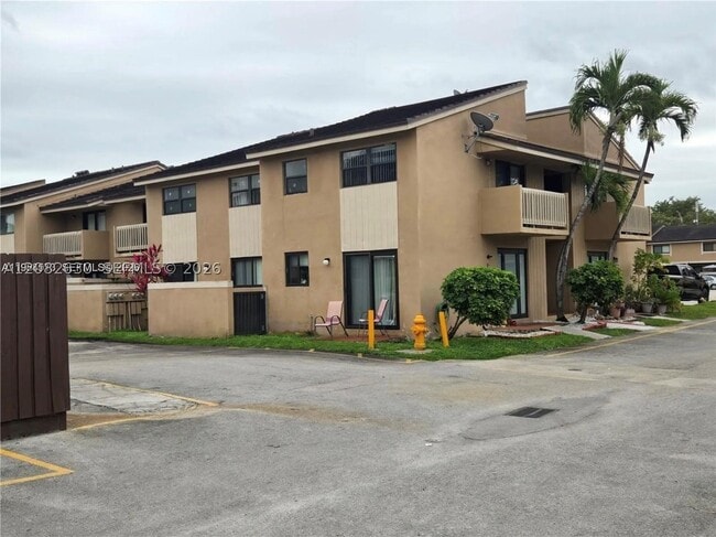 Building Photo - 15445 SW 80th St Unit 202