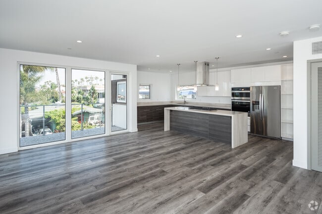 107A 3BR, 3BA - 1,740SF - Kitchen and Living Room