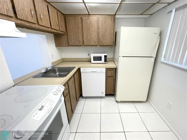 Photo - 2800 NW 56th Ave Condo Unit E405