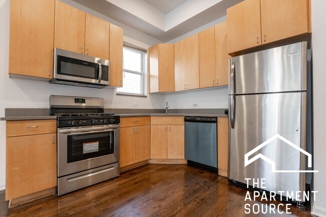 Building Photo - Spacious 4BR/2BA in Logan Square — Steps f... Unit 1 Rental
