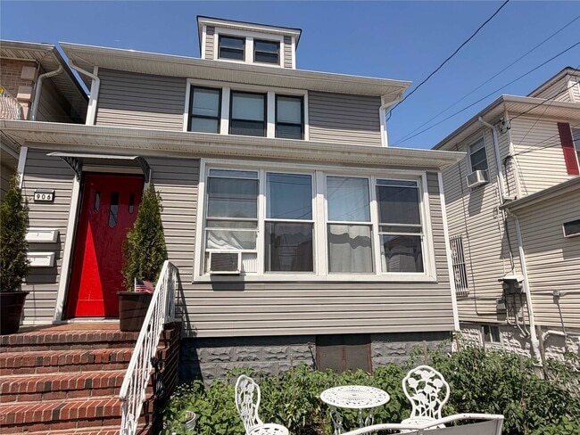 Building Photo - 906 76th St Unit 2