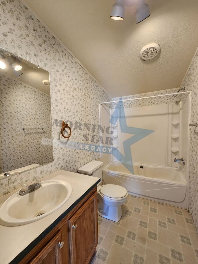 Photo - Spacious 3-Bed with Enclosed Yard and Storage Shed!