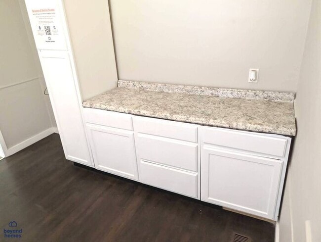 Photo - Updated Bungalow with Massive Deck and Fully Fenced Yard!