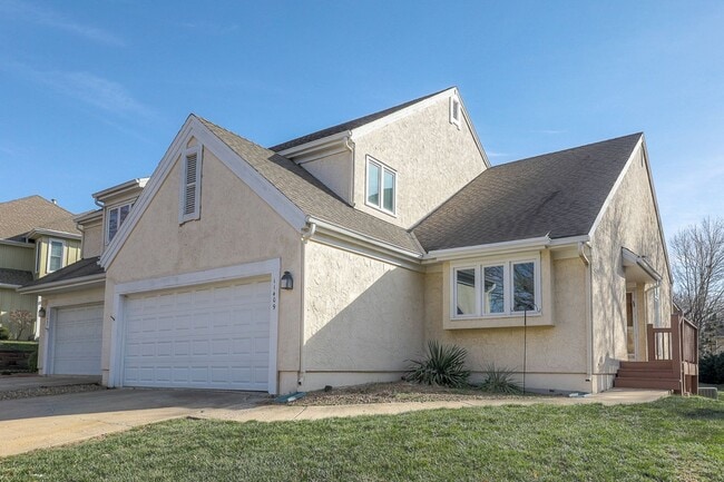 Photo - {11409} Updated Duplex in Fantastic Location + Two Car Garage + Main Level Master + Covered Deck