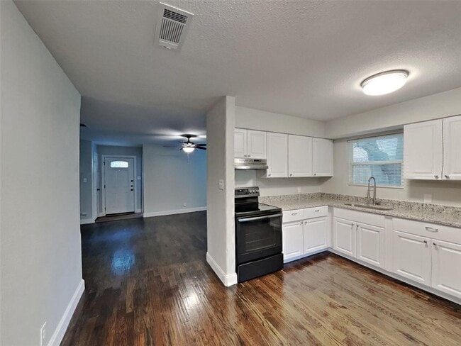 Photo - 3 BR/1.5BA | Renovated Single Family Home | 1-Car Garage | Gated backyard