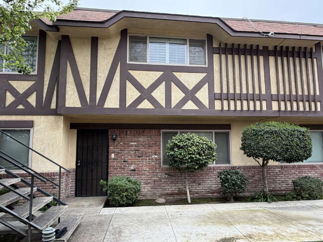 Building Photo - Spacious Two-Story Townhome with Remodeled Bathrooms, Private Patio & Community Pool Unit #16