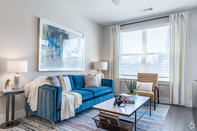 2HAB, 2BA - 1,030 pies cuadrados (Tipo B1) - Sala de estar - Avonlea Pointe