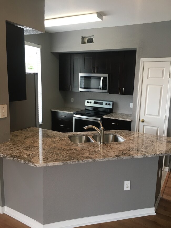 Photo - 9744 Lake Chase Island Way Unit Lake Chase Condo