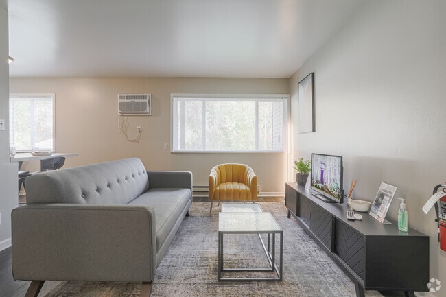 1BR, 1BA - 700SF - Living Room - Village Square Apartments