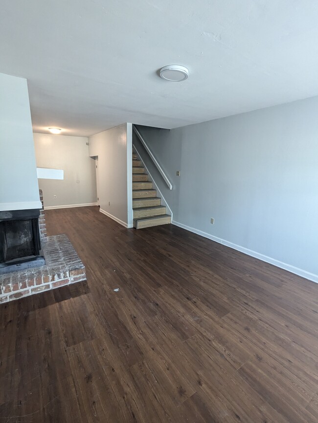 Living Room and Dining Area - 4923 Kennesaw Dr Townhome