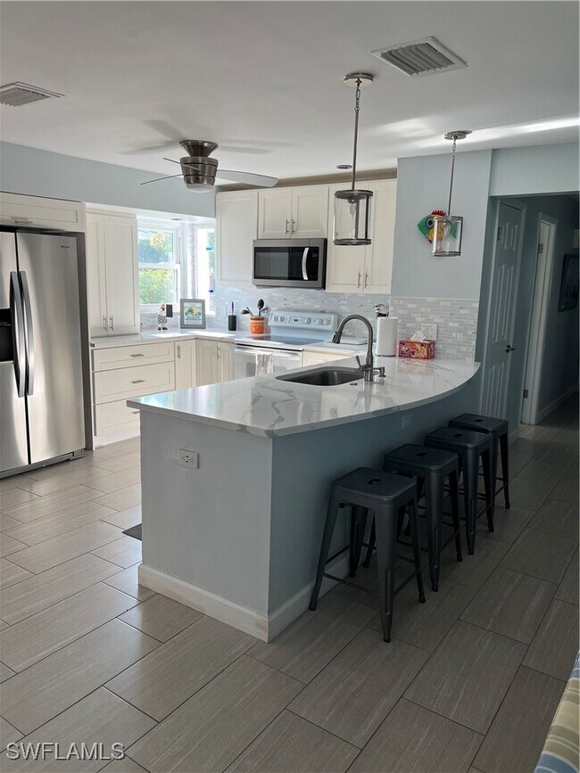 Photo - 671 100th Ave N