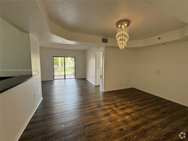 Building Photo - 9300 Fontainebleau Blvd Unit E201 Rental
