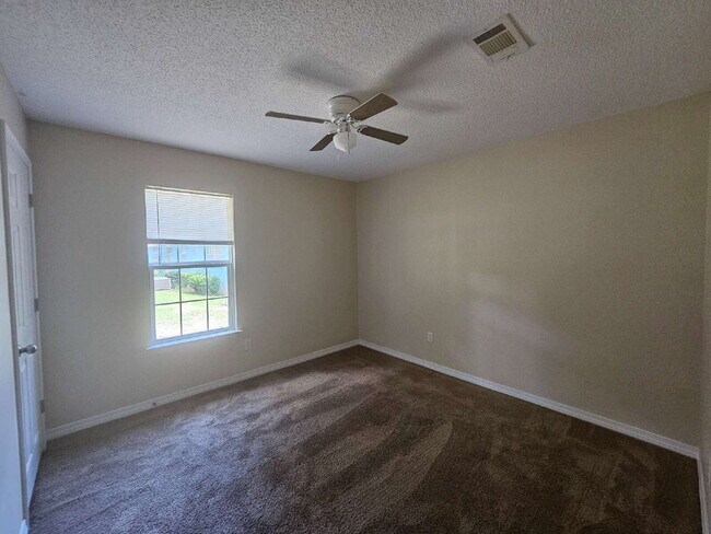 Photo - "Charming 3-Bed, 2-Bath Retreat Awaits!"