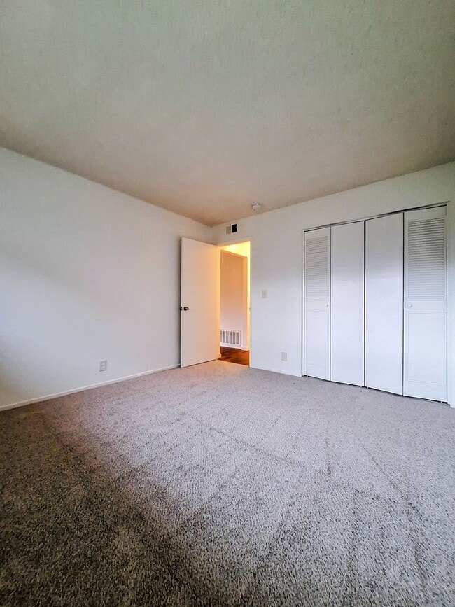 Photo - Ground Floor 2bd Condo With On-site Laundry, Carport, & Pool! Unit 1