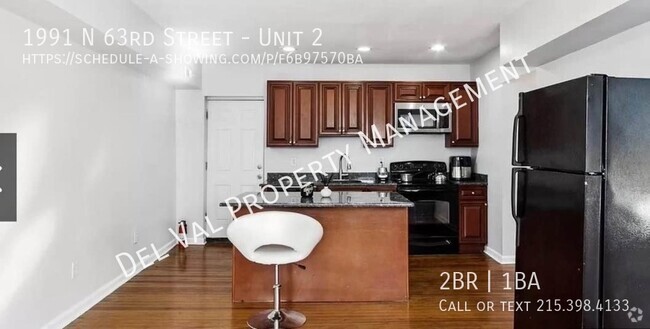 Building Photo - Rent Just Got Better! Spacious & Stylish 2... Unit 2 Rental