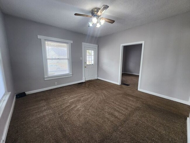 Photo - Charming 3-bedroom, 1-bath home with a bright living space, spacious bedrooms, and an easy-to-mai...