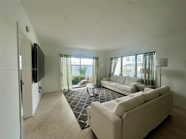 Building Photo - 1135 101st St Unit 3