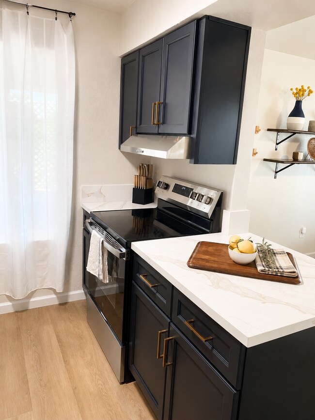 Easy & stress-free move-in experience-we’ve provided a fully stocked kitchen. - 1795 W 28th St