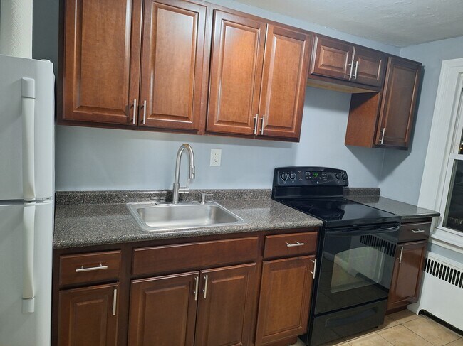 New kitchen cabinets - 6404 Marsden St. Townhome