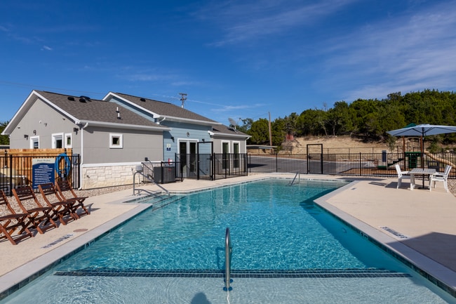 A refreshing community feature perfect for lounging and swimming. - Vista Bella