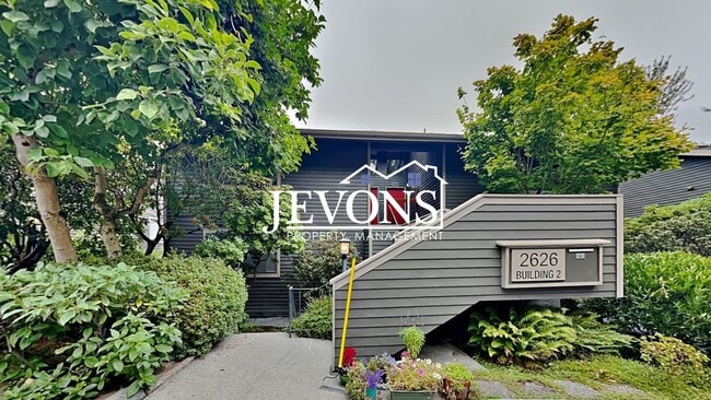 Photo - Top-floor 2-level condo with brand-new kitchen and ensuite bath – Utilities and internet included...