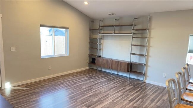 Integrated entertainment stand offers enough space for a 60" TV - 521 Perry St