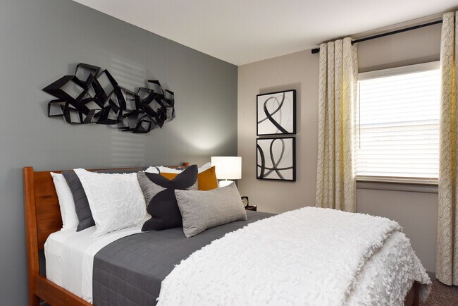 Experience comfort and style in this beautifully designed bedroom.