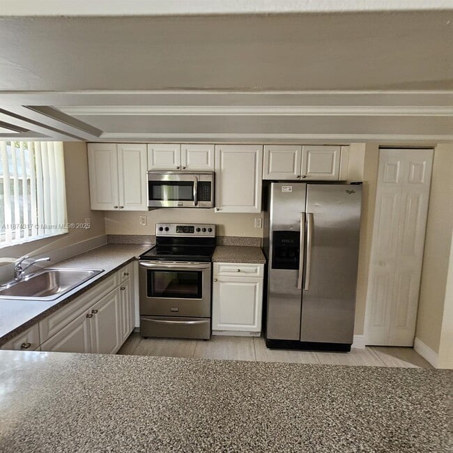Photo - 741 N Pine Island Rd Unit 212