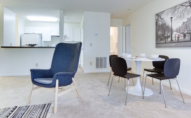 Carpeted living and dining area