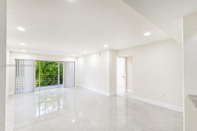 Building Photo - 4205 N University Dr Unit 206