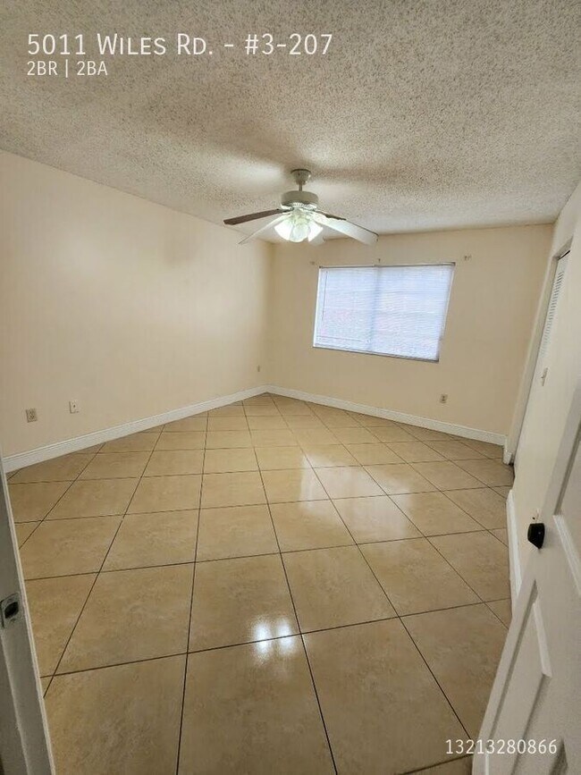 Photo - 5011 Wiles Rd Unidad #3-207