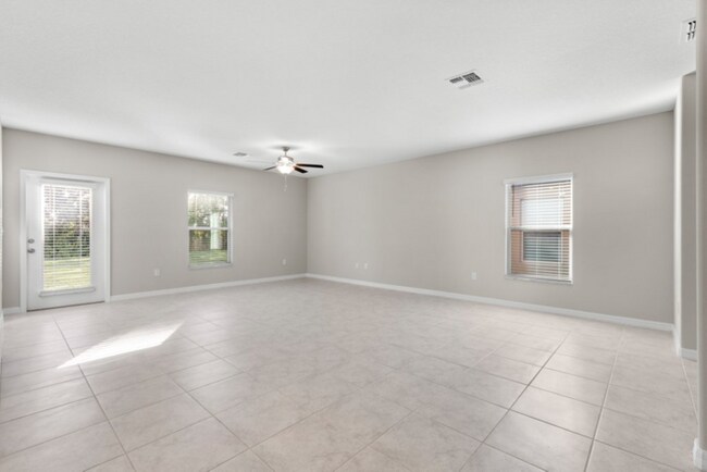 Photo - "Spacious 5-Bedroom Retreat in Apollo Beach - Modern Living with 2.5 Baths on White Chicory Dr!"
