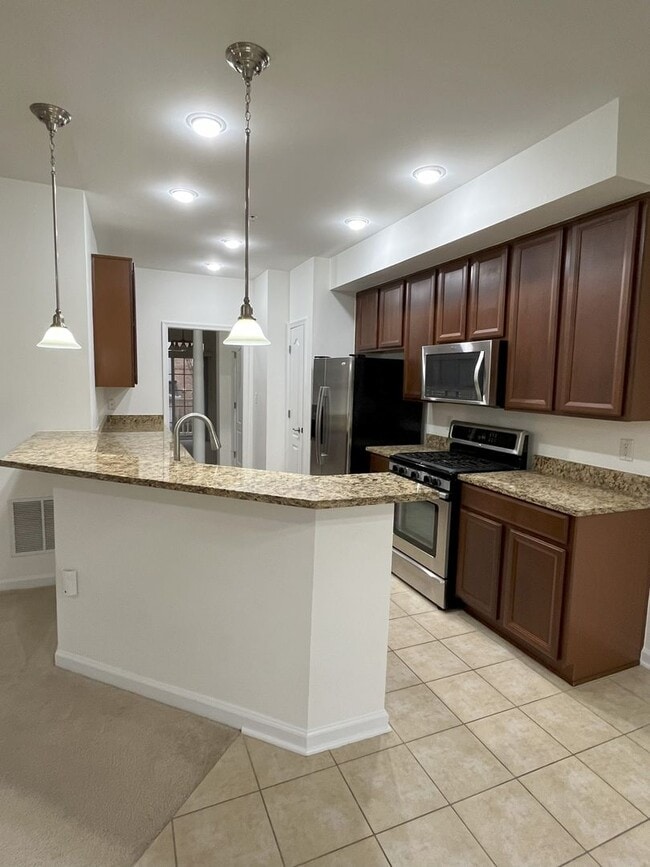 Photo - Sizable End Unit Townhome in Wheaton w/ 2 Car Garage!