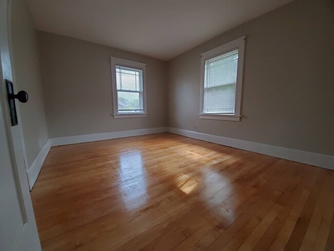 Photo - Immaculate 4 Bedroom Single Family with Central AC and Detached Garage, parking lane, and Large B...