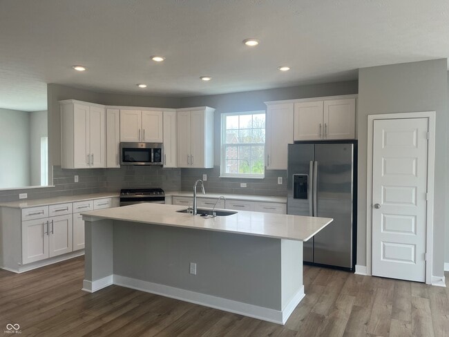 Photo - 6910 Equality Blvd Townhome