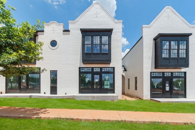 Building Photo - Bright. Clean. Calm. Your Elevated One-Bed... Rental