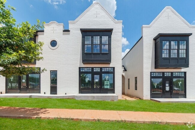 Building Photo - Bright. Clean. Calm. Your Elevated One-Bed... Rental