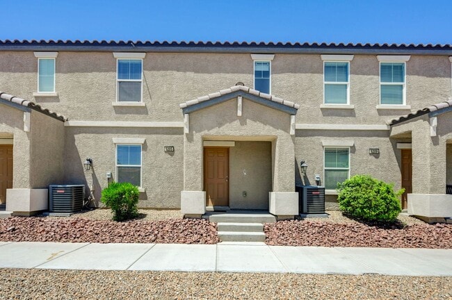 Building Photo - Newer Townhome - 3 Bedrooms + 2 Car Garage - E Craig & Nellis