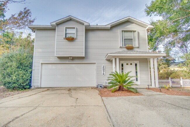 Photo - Live the Gulf Breeze Waterfront Life – Dock, Canal Access & Boat Lift!