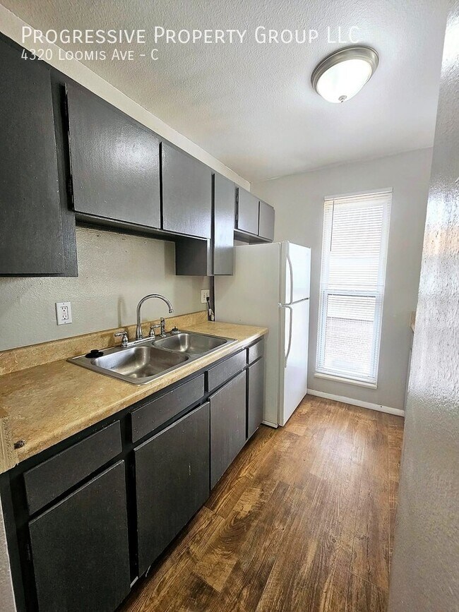 Photo - MOVE IN SPECIAL: First Months Rent FREE! C... Unit C