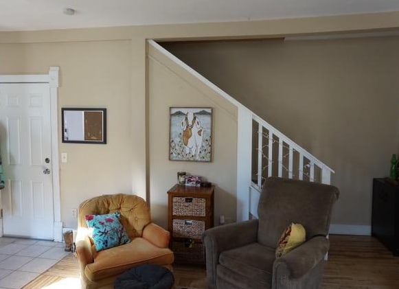 Living room - stairs to upper loft and bedroom - 2102 25th Ave S Unit #2