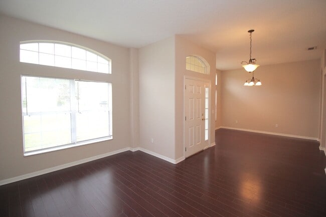 Photo - Huge 4 Bed 3 Bath Home w FENCED YARD and SCREENED LANAI for Rent!